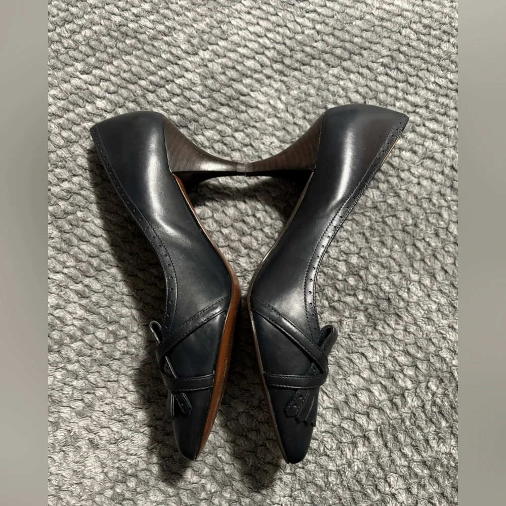 Brooks Brothers black leather fringe and buckle pointed toe heels. Size 7
